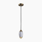 Minimalist copper K9 chandelier with oval glass shade, gold accents, LED lighting, black cord.