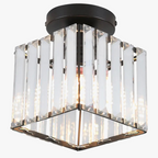 Modern industrial chandelier with square glass fixture, vertical clear crystals, and dark metal base.