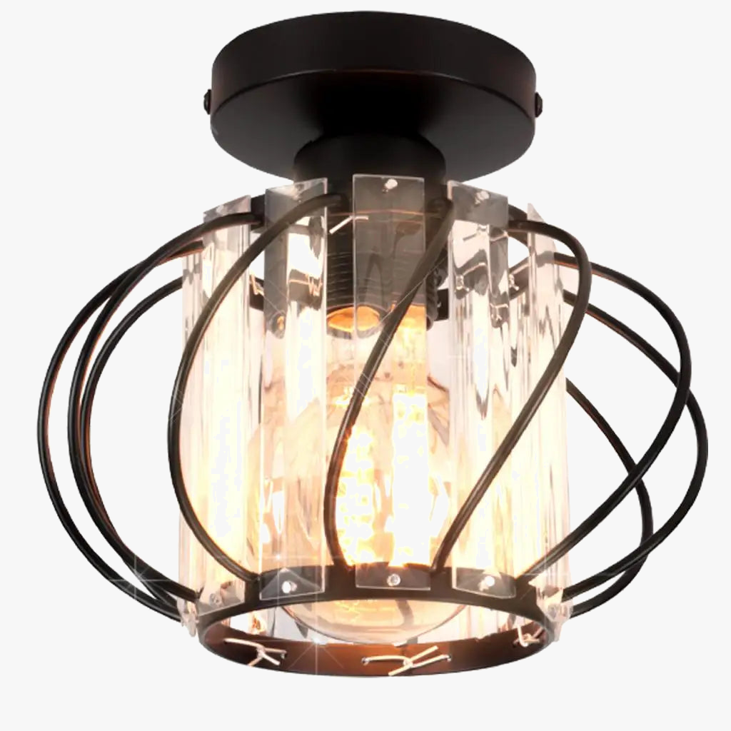 Modern chandelier with black metal base, clear glass panels, and exposed bulb; curved industrial accents.