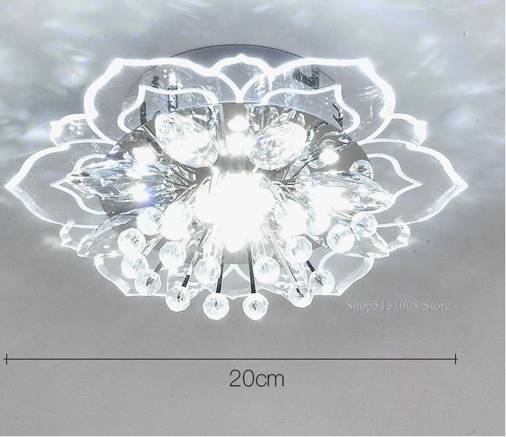 Colorful crystal ball chandelier with illuminated floral petals, Art Deco style, 20 cm diameter.