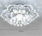 Colorful crystal ball chandelier with illuminated floral petals, Art Deco style, 20 cm diameter.