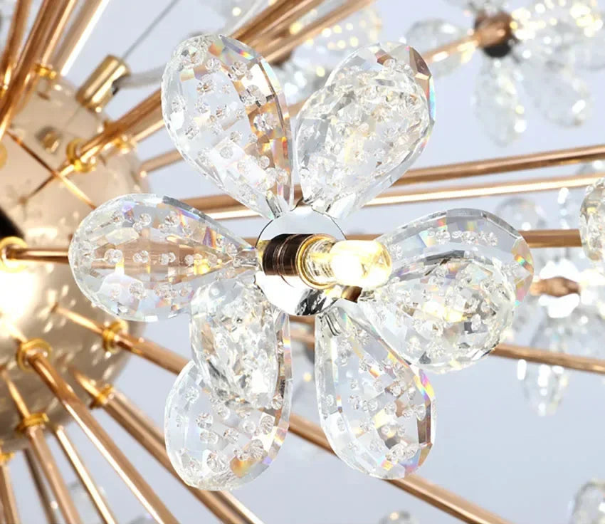 Crystal Dandelion Round LED chandelier with gold rods and clear crystal petals in starburst design.