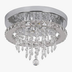 Modern crystal LED chandelier with silver round base, two crystal tiers, and central pendant.
