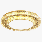 Elegant modern chandelier with concentric gold rings and sparkling crystals, radiating a warm LED glow.