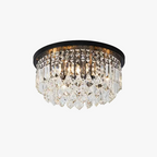 Round flush-mount chandelier with dark metal base, layered crystal prisms, and adjustable LED lights.