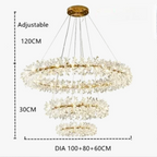 Three gold LED ring chandelier with crystal accents, adjustable wires, and 120 cm total height.