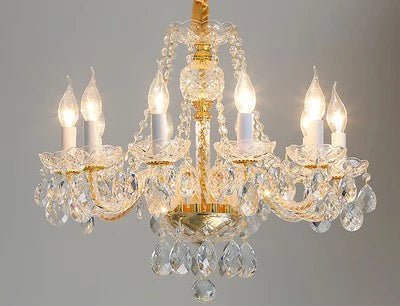 Lustre baroque en cristal aux nuances dorées pour intérieur élégant