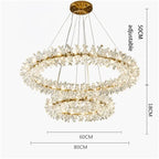 Two gold-detailed crystal chandelier rings, floral accents, adjustable height up to 50 cm.
