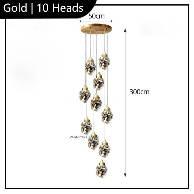 10 geometric crystal LED pendants hang from a 50 cm gold base, creating a modern chandelier.