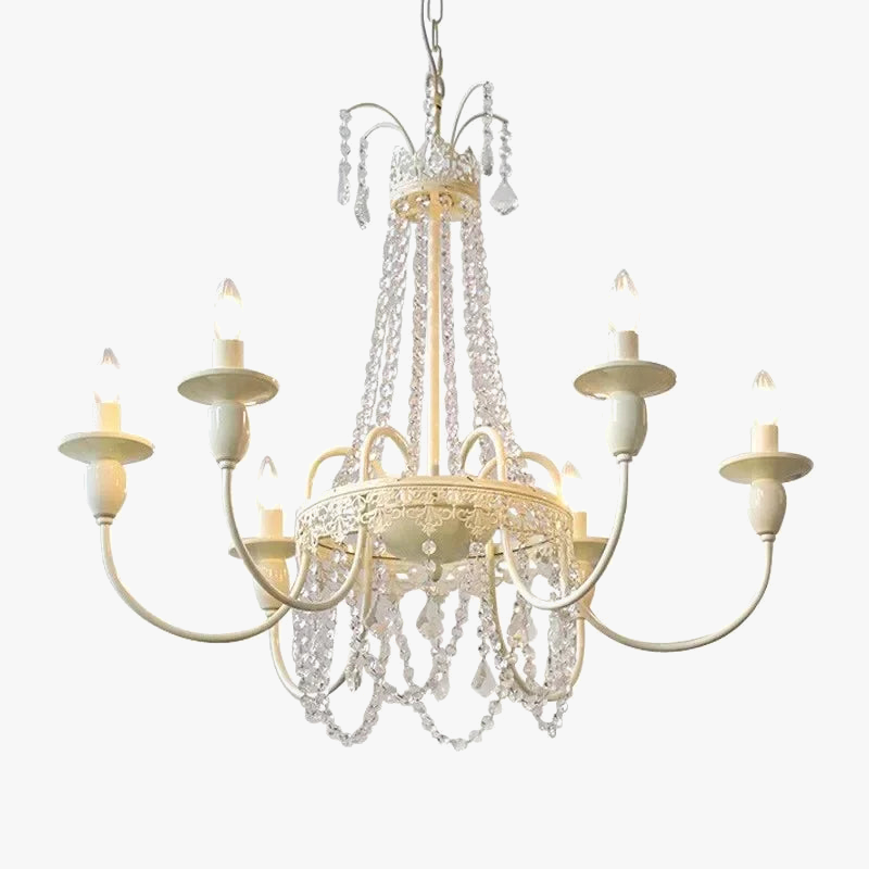 Ornate French-style crystal chandelier with eight candle bulbs, metal arms, and cascading crystals.