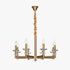 Retro industrial iron chandelier with six candle bulbs, crystal accents, and gold-fabric stem.