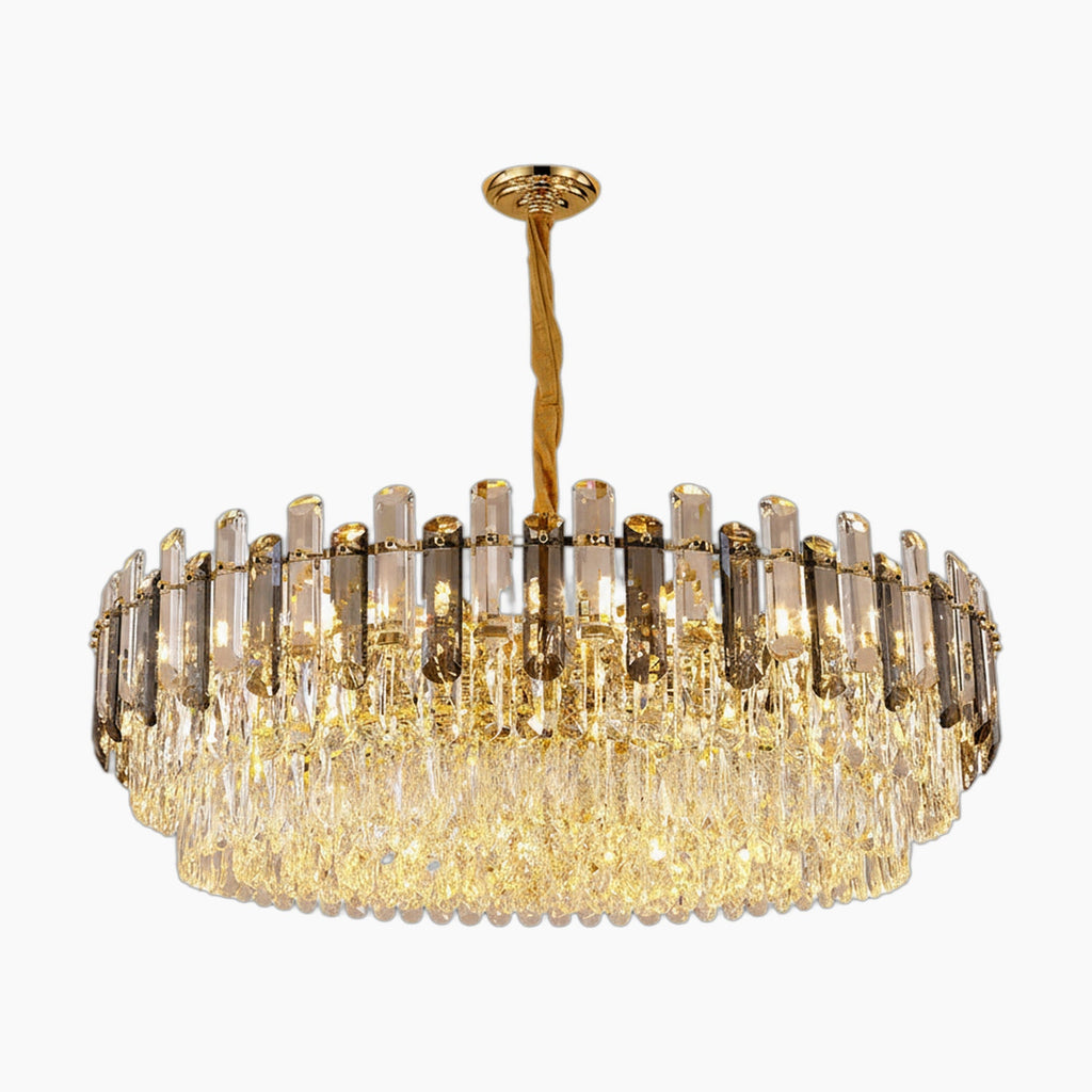 Gold-accented modern chandelier with layered crystal prisms and warm LED lighting, elegant centerpiece design.