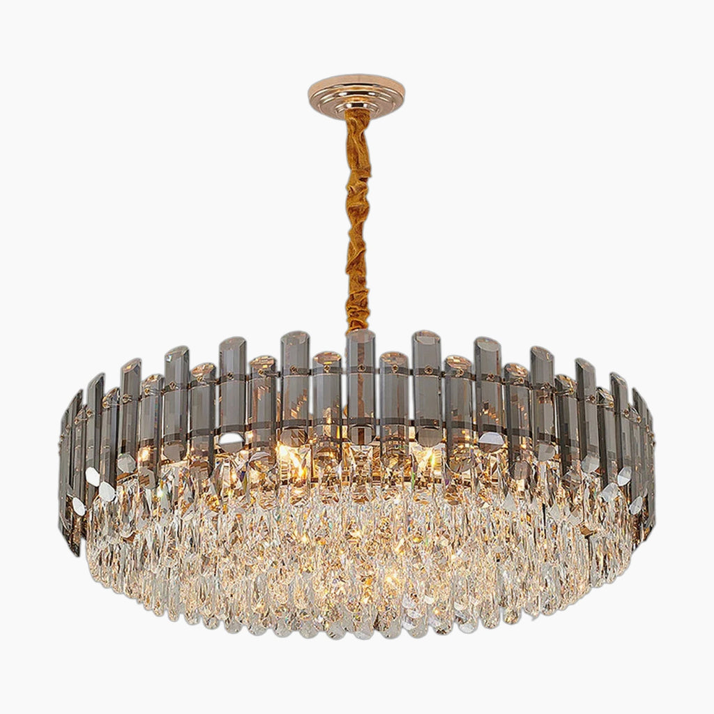 Elegant LED crystal chandelier with gold mount and cord, multi-tiered crystals, emits warm light.