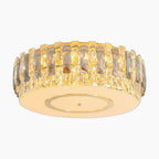 Round chandelier with gold frame, dimmable LED, and vertical rectangular crystal glass accents. Modern style.