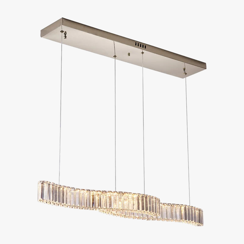 Rectangular mount chandelier with four cables and wavy vertical crystals emitting warm LED light.