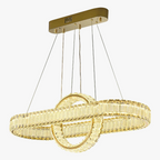 Gold-base LED chandelier with two intertwined crystal rings, creating a warm, elegant illumination.