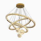 Three intersecting crystal LED rings and four starry glass bulbs form a modern chandelier.