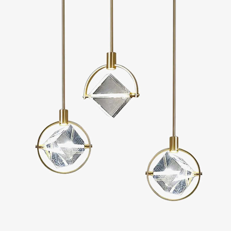 Luxurious postmodern Nordic chandelier with three brass-framed geometric glass pendants on thin rods.