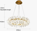 Luxurious gold chandelier with clear crystals, round design, adjustable hang up to 120 cm.
