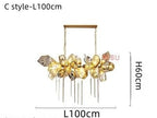 Gold and crystal chandelier with integrated LED, stainless steel frame, two suspension chains, modern floral design.