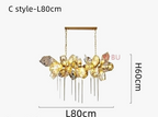 Modern crystal chandelier with stainless steel, gold floral accents, integrated LED, two-chain gold mount.