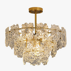 Maison Ornate Crystal Ball Chandelier with floral crystal layers, gold rod, and warm lighting.