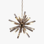 Starburst chandelier with crystal-tipped arms, exposed bulbs, and radiant central sphere design.