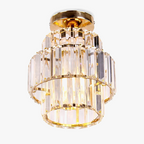 Tiered rectangular glass prisms form a modern K9 crystal LED chandelier with a warm, elegant glow.