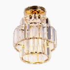 Maison Ornate Modern LED chandelier with tiered K9 crystal prisms in a sleek cylindrical form.