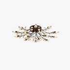 Maison Ornate chandelier with golden or black branches, leaf-shaped LED lights; modern, nature-inspired design.