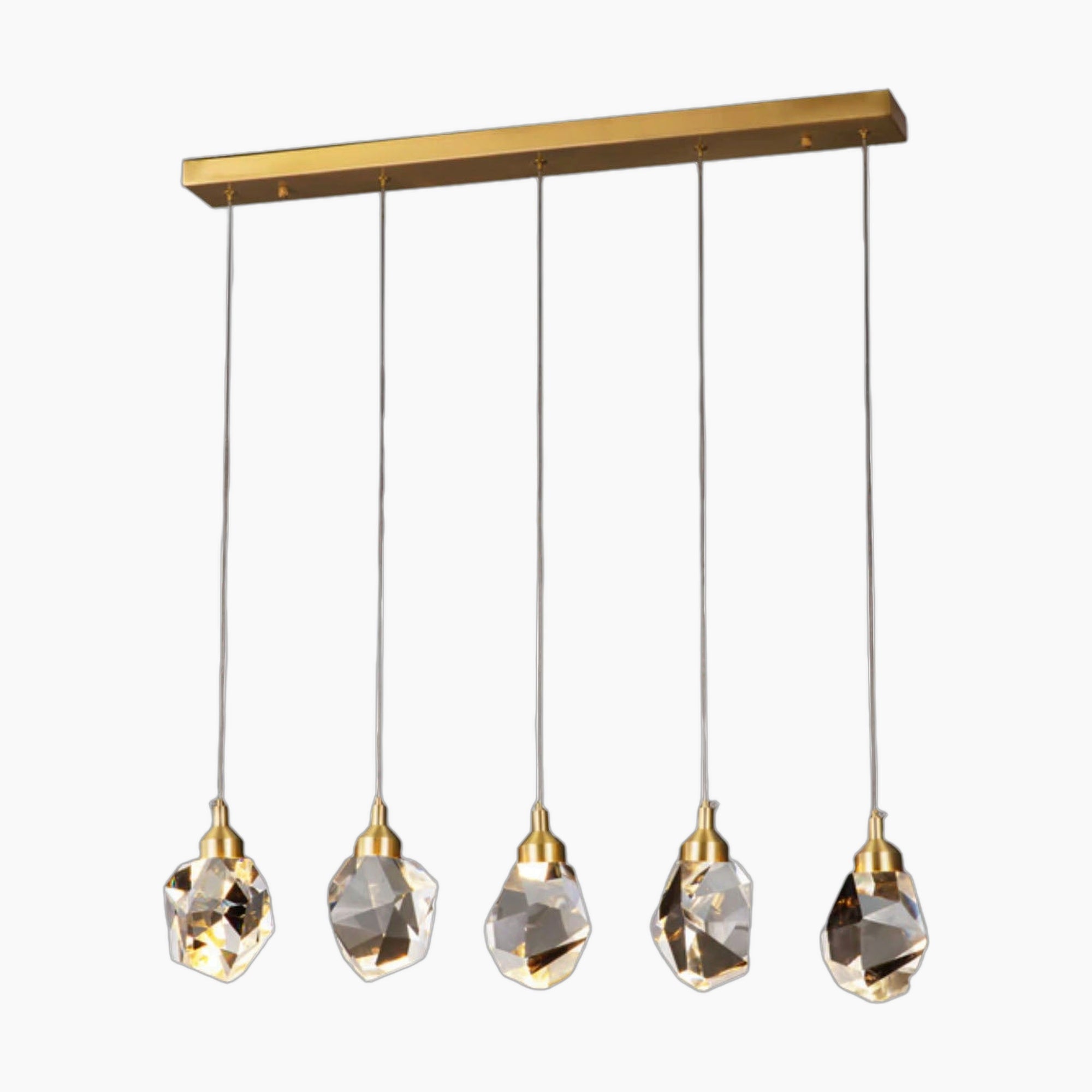 Five gold fixtures with geometric crystal pendants hang from a rectangular gold chandelier mount.