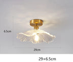 Maison Ornate Modern Crystal Chandelier with gold base, clear leaf glass shade, LED lighting.