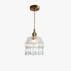 Vintage-inspired Nordic chandelier with clear glass, crystal accents, brass mount, and twisted cord.