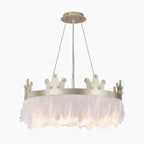 Gold crown chandelier with crystals, white feather trim, three-wire suspension, LED compatible.