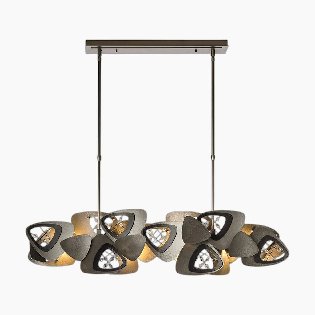 Postmodern crystal ball chandelier with geometric metallic shades, triangular cutouts, and warm artistic lighting.