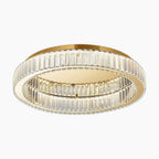 Gold-rimmed round chandelier with dual crystal-accented rings, dimmable LEDs, and adjustable brightness.