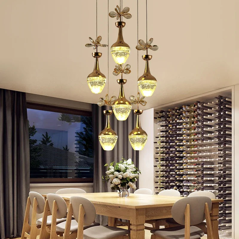 Maison Ornate Minimalist Elegant Crystal Pendant with LED, a sleek chandelier featuring sparkling crystals.