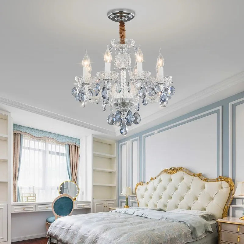 Maison Ornate Baroque Crystal Chandelier with golden accents, elegant crystal details and intricate decorative design.