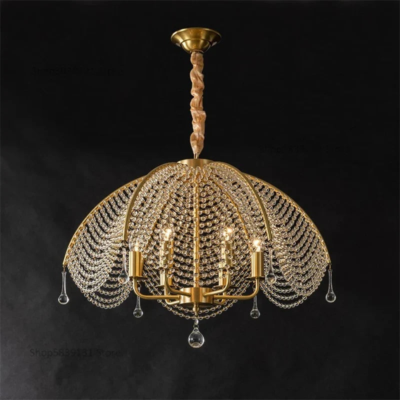 Nordic chandelier with gold copper elements, dome shape, crystal beads, and six candle-style lights.