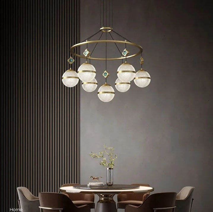 The Maison Ornate 2021 Modern Minimalist Crystal Hanging Light with seven globe-shaped bulbs.