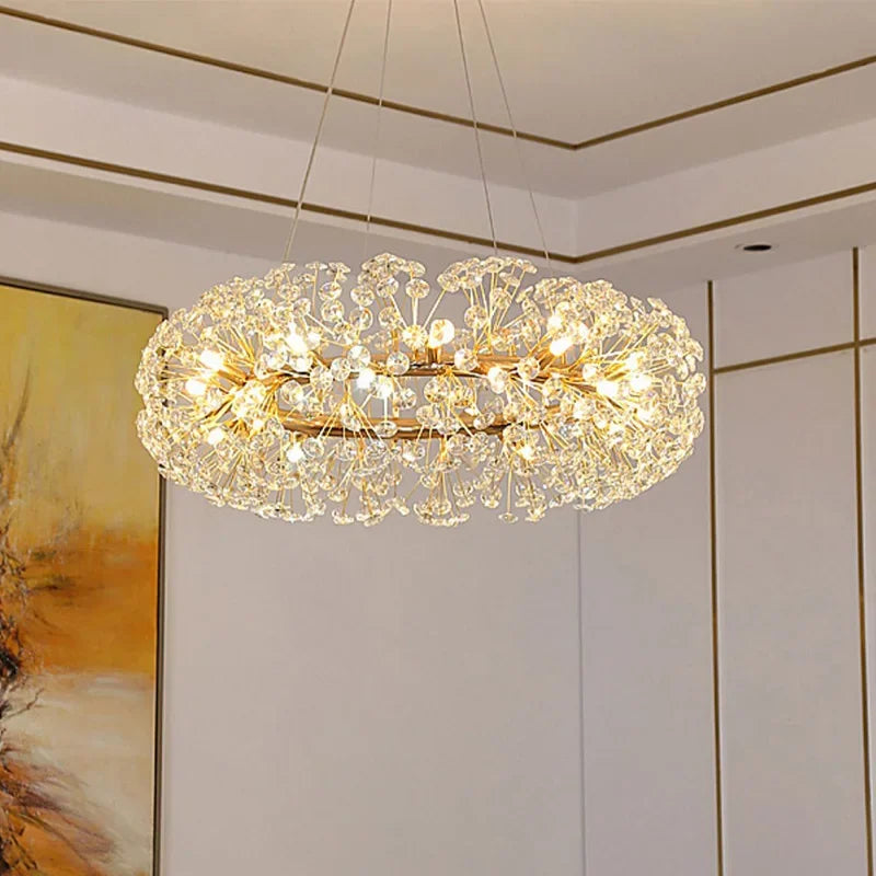 Modern gold-frame chandelier with dandelion-inspired crystals and LED lighting, exuding elegant contemporary style.