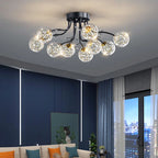 Maison Ornate Crystal Ball Chandelier with LED star lights and clear glass globe bulbs.