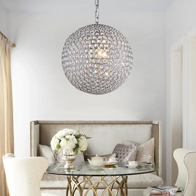 Maison Ornate Round Crystal Ball LED chandelier with modern design and shimmering crystal accents.