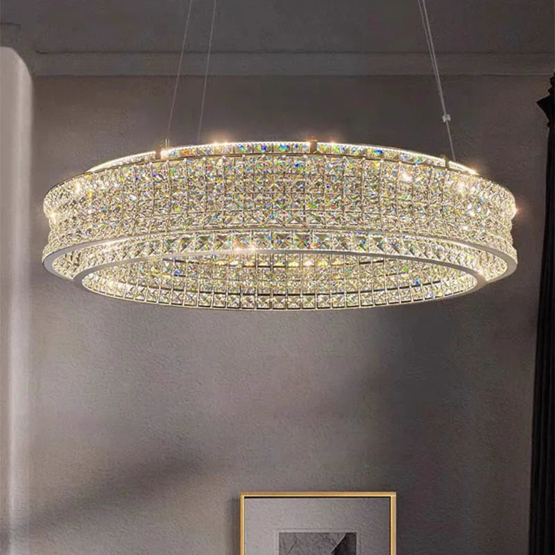 Maison Ornate Crystal Ball Pendant: two-tier circular chandelier, sparkling light, stainless steel adjustable cord.