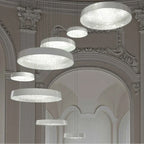 Maison Ornate’s crystal chandelier features large circular pendants and thin wires for a floating effect.