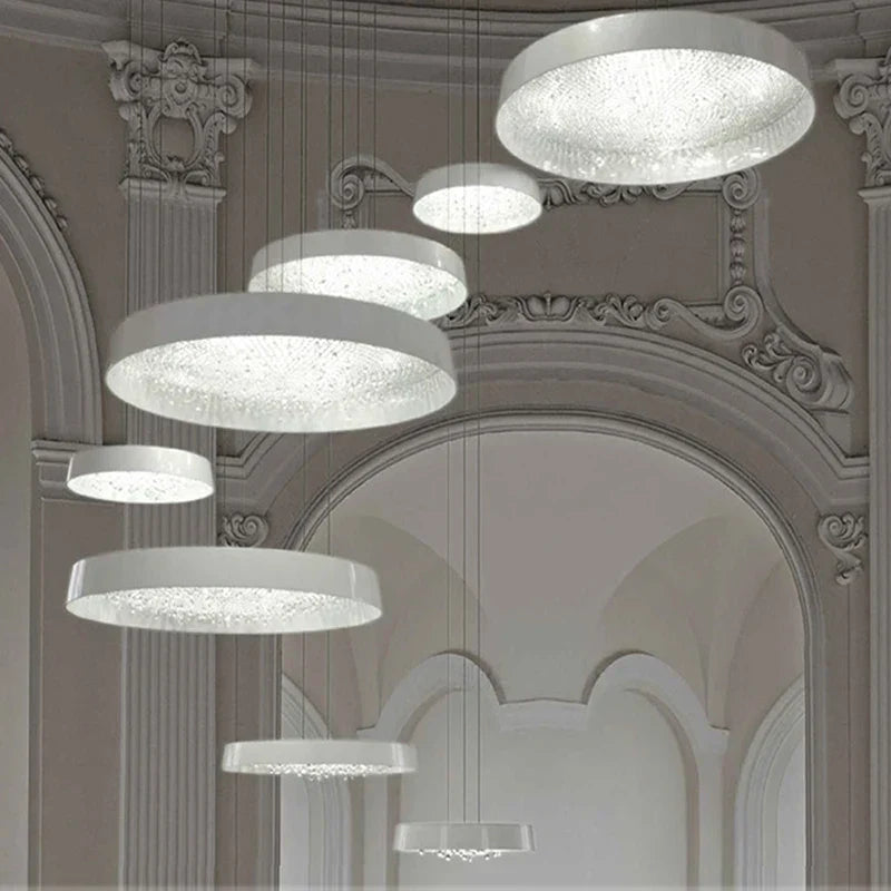 Maison Ornate’s crystal chandelier features large circular pendants and thin wires for a floating effect.