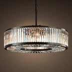 Maison Ornate crystal chandelier with black metal frame and vertical prisms, reflecting elegant luxury.