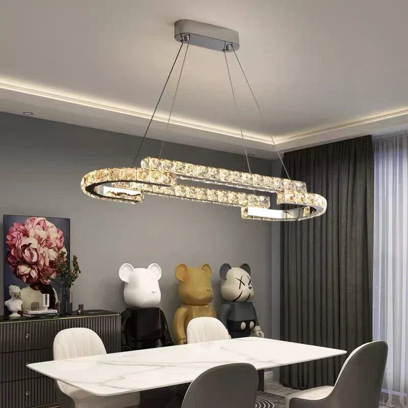 Maison Ornate Crystal Chandelier featuring stainless steel frame and energy-efficient LED lighting. Sparkling, elegant design.