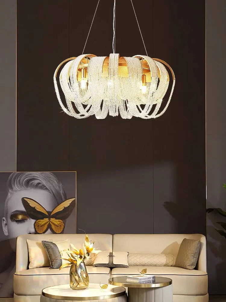 Maison Ornate Modern Nordic Crystal Chandelier with LED Tassels, sleek gold accents and contemporary design.