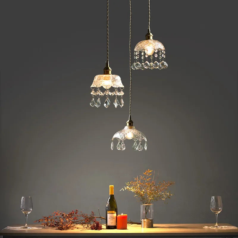 Three Maison Ornate Nordic Crystal Glass Chandeliers with intricate crystal details, elegantly illuminated.